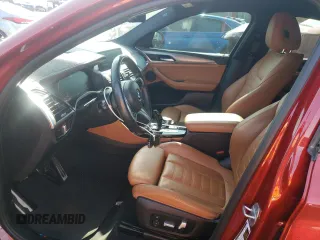 2021 BMW X4 M40i with VIN 5UX2V5C0XM9E78318, listed as a Copart auction lot 57834645 with 67,277 mi miles and Salvage title. Bid and sale history available at DreamBid. Image 7.