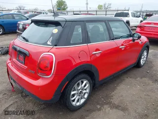 2019 MINI Hardtop 4 Door Cooper with VIN WMWXU1C58K2J02294, listed as a IAAI auction lot 41910654 with 97,887 mi miles. Bid and sale history available at carsss.com. Image 4.