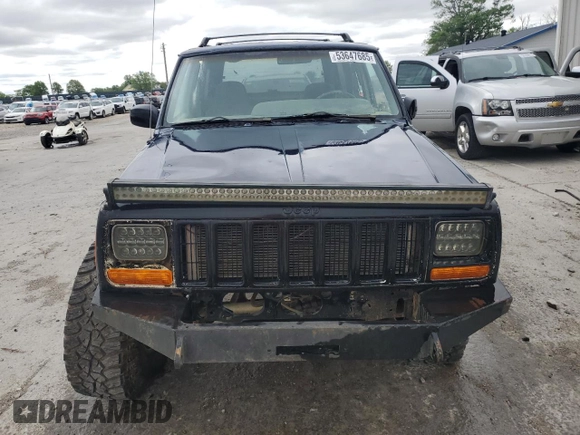 2000 Jeep Cherokee with VIN 1J4FF48S7YL209729, listed as a Copart auction lot 53647685 with 268,552 mi miles and Salvage title. Bid and sale history available at DreamBid. Image 5.