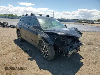2019 Volkswagen Tiguan SE z VIN 3VV2B7AX5KM201272, wystawiony jako Copart lot #58032315 z przebiegiem Nie podano mil oraz Szkoda całkowita • Salvage title. Historia ofert i sprzedaży dostępna na DreamBid. Obrazek 14.