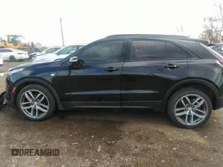 2021 Cadillac XT4 AWD Sport with VIN 1GYFZFR48MF009552, listed as a IAAI auction lot 41743125 with 53,982 mi miles and . Bid and sale history available at DreamBid. Image 14.