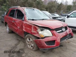2009 Kia Sportage LX z VIN KNDJF724997564388, wystawiony jako IAAI lot #41671262 z przebiegiem 297 472 mil mil oraz . Historia ofert i sprzedaży dostępna na DreamBid. Obrazek 1.