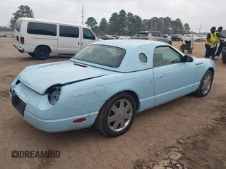 2003 Ford Thunderbird Deluxe z VIN 1FAHP60A53Y101461, wystawiony jako IAAI lot #41797831 z przebiegiem 64 760 mil mil oraz . Historia ofert i sprzedaży dostępna na DreamBid. Obrazek 4.