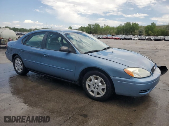 2006 Ford Taurus SE with VIN 1FAHP53296A241444, listed as a Copart auction lot 58343615 with 125,385 mi miles and Salvage title. Bid and sale history available at DreamBid. Image 4.