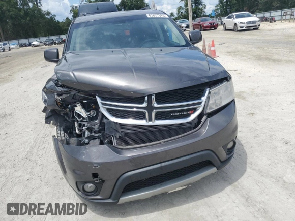2017 Dodge Journey SXT z VIN 3C4PDCBG9HT515799, wystawiony jako Copart lot #62827975 z przebiegiem 156 215 mil mil oraz Szkoda całkowita • Salvage title. Historia ofert i sprzedaży dostępna na DreamBid. Obrazek 5.