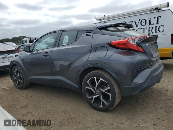 2018 Toyota C-HR XLE with VIN NMTKHMBX0JR042667, listed as a Copart auction lot 54173255 with 50,395 mi miles and Salvage Title. Bid and sale history available at carsss.com. Image 2.