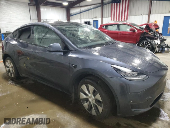 2022 Tesla Model Y Long Range with VIN 7SAYGDEE7NF422837, listed as a Copart auction lot 55271665 with 52,976 mi miles and Clean Title. Bid and sale history available at DreamBid. Image 4.