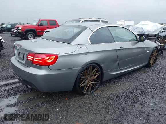 2013 BMW 3 Series 335i with VIN WBADX7C54DJ590228, listed as a IAAI auction lot 41250640 with 112,693 mi miles and . Bid and sale history available at DreamBid. Image 4.