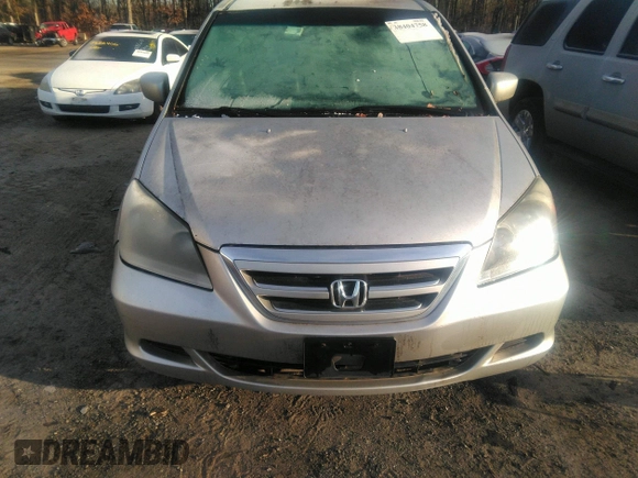 2006 Honda Odyssey EX-L with VIN 5FNRL38616B413712, listed as a IAAI auction lot 39878116 with 228,623 mi miles. Bid and sale history available at carsss.com. Image 6.