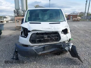 2016 Ford Transit Cargo with VIN 1FTYR1ZM2GKA38963, listed as a IAAI auction lot 42027447 with 70,659 mi miles and . Bid and sale history available at DreamBid. Image 12.