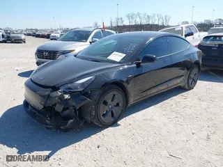 2022 Tesla Model 3 Long Range with VIN 5YJ3E1EB2NF174028, listed as a IAAI auction lot 41697310 with NaN miles. Bid and sale history available at carsss.com. Image 16.