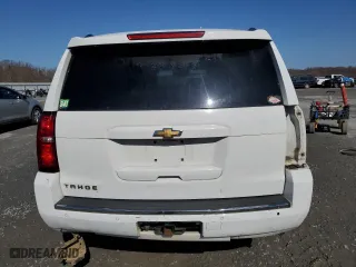 2015 Chevrolet Tahoe LTZ with VIN 1GNSKCKC9FR666040, listed as a Copart auction lot 44431875 with 233,166 mi miles and Salvage Title. Bid and sale history available at carsss.com. Image 6.