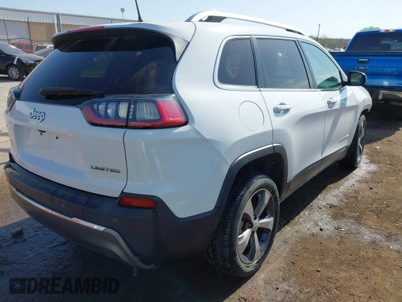2019 Jeep Cherokee Limited with VIN 1C4PJLDBXKD487843, listed as a IAAI auction lot 41979449 with 104,545 mi miles. Bid and sale history available at carsss.com. Image 4.