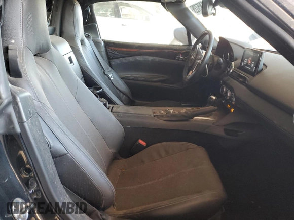 2023 Mazda MX-5 Miata Grand Touring z VIN JM1NDAM71P0551782, wystawiony jako Copart lot #88795725 z przebiegiem 22 626 mil mil oraz Nie do naprawy • Non repairable. Historia ofert i sprzedaży dostępna na DreamBid. Obrazek 10.