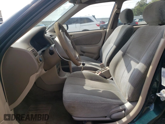 1999 Toyota Corolla VE with VIN 2T1BR12E8XC255511, listed as a Copart auction lot 55388585 with 81,645 mi miles and Salvage title. Bid and sale history available at DreamBid. Image 7.