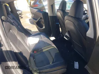 2023 Tesla Model Y Long Range with VIN 7SAYGAEE9PF905943, listed as a IAAI auction lot 41444255 with 11,179 mi miles and . Bid and sale history available at DreamBid. Image 8.