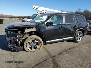 2023 Honda Pilot EX-L 7 Passenger with VIN 5FNYG1H52PB013462, listed as a Copart auction lot 79597574 with 25,302 mi miles and Salvage Title. Bid and sale history available at carsss.com. Image 1.