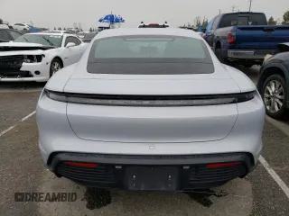 2021 Porsche Taycan 4S z VIN WP0AB2Y15MSA44483, wystawiony jako Copart lot #44510623 z przebiegiem 27 812 mil mil oraz . Historia ofert i sprzedaży dostępna na DreamBid. Obrazek 6.