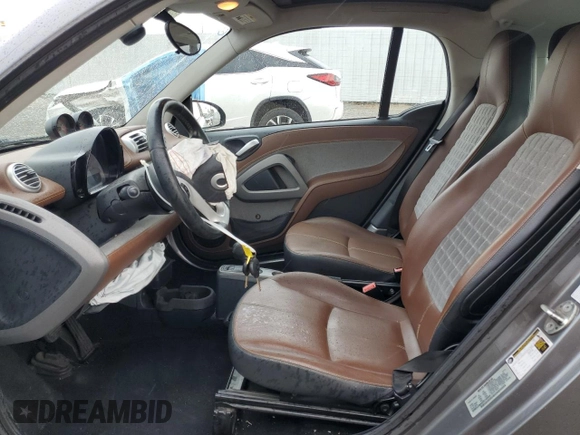 2014 Smart fortwo Pure with VIN WMEEJ3BAXEK745569, listed as a Copart auction lot 48601055 with 114,673 mi miles and Salvage title. Bid and sale history available at DreamBid. Image 7.