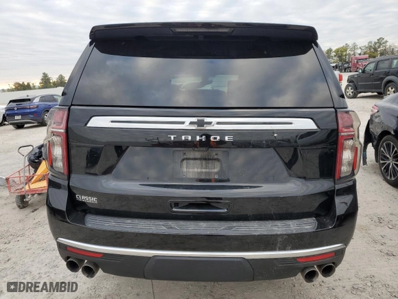 2021 Chevrolet Tahoe High Country with VIN 1GNSCTKL3MR183802, listed as a Copart auction lot 77540973 with 57,283 mi miles and Salvage Title. Bid and sale history available at carsss.com. Image 6.
