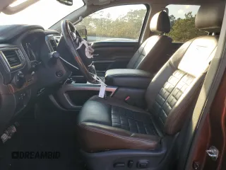 2016 Nissan Titan SL z VIN 1N6BA1F2XGN506885, wystawiony jako Copart lot #43457125 z przebiegiem 51 323 mil mil oraz Szkoda całkowita • Salvage title. Historia ofert i sprzedaży dostępna na DreamBid. Obrazek 7.