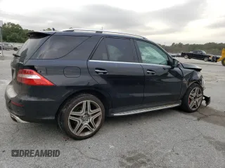 2015 Mercedes-Benz M 63 AMG with VIN 4JGDA7EB0FA440509, listed as a Copart auction lot 73954174 with 74,650 mi miles and Salvage Title. Bid and sale history available at carsss.com. Image 3.