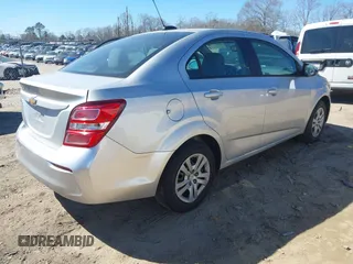 2018 Chevrolet Sonic LS with VIN 1G1JB5SH2J4112817, listed as a IAAI auction lot 41620486 with 60,479 mi miles and . Bid and sale history available at DreamBid. Image 4.