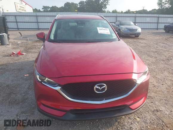 2017 Mazda CX-5 Grand Touring with VIN JM3KFADL8H0189033, listed as a IAAI auction lot 40029931 with 88,933 mi miles and . Bid and sale history available at carsss.com. Image 13.