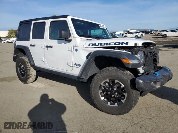 2024 Jeep Wrangler Rubicon with VIN 1C4RJXR6XRW115879, listed as a Copart auction lot 45816825 with 34,557 mi miles and Salvage Title. Bid and sale history available at DreamBid. Image 4.