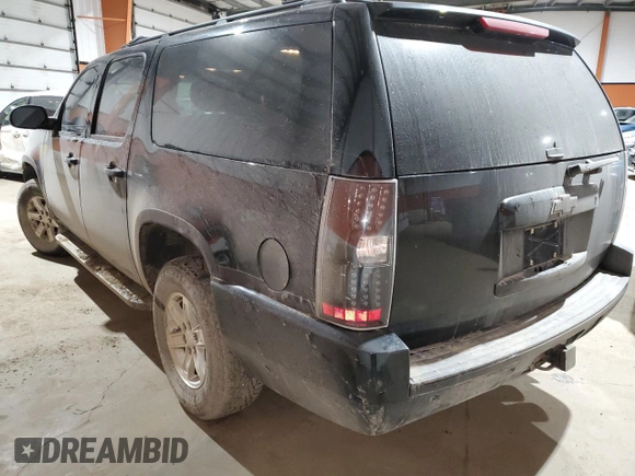 2010 Chevrolet Suburban LTZ with VIN 1GNUKKE38AR283830, listed as a Copart auction lot 84887104 with 298,548 mi miles and Salvage Title. Bid and sale history available at carsss.com. Image 2.