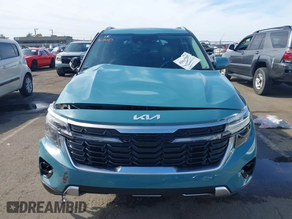 2024 Kia Seltos EX with VIN KNDERCAA0R7520708, listed as a IAAI auction lot 41687597 with 10,470 mi miles and . Bid and sale history available at DreamBid. Image 13.