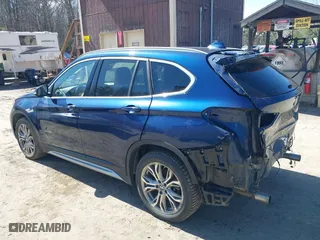 2017 BMW X1 xDrive28i with VIN WBXHT3C33H5F82035, listed as a IAAI auction lot 41944399 with 102,942 mi miles. Bid and sale history available at carsss.com. Image 3.