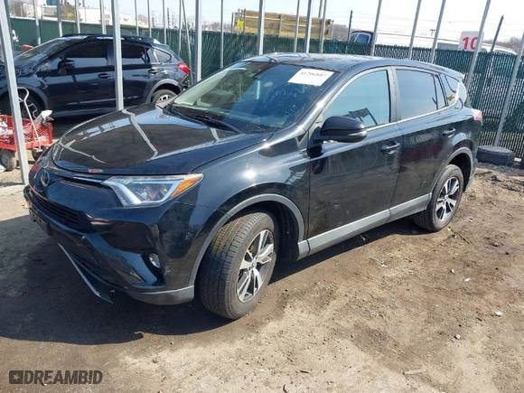 2018 Toyota RAV4 XLE with VIN 2T3WFREV6JW477658, listed as a IAAI auction lot 41706807 with 146,829 mi miles. Bid and sale history available at carsss.com. Image 2.