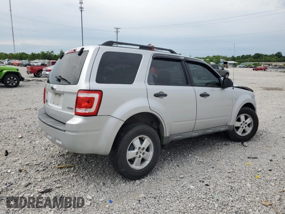 2009 Ford Escape XLS z VIN 1FMCU92789KB10338, wystawiony jako Copart lot #57452495 z przebiegiem 285 171 mil mil oraz Szkoda całkowita • Salvage title. Historia ofert i sprzedaży dostępna na DreamBid. Obrazek 3.