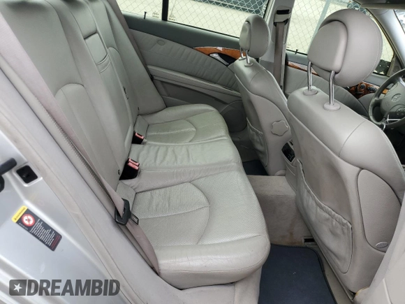 2003 Mercedes-Benz E-Class 5.0L with VIN WDBUF70J03A112909, listed as a Copart auction lot 49924865 with 158,244 mi miles and Salvage Title. Bid and sale history available at carsss.com. Image 10.