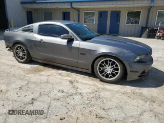 2013 Ford Mustang GT with VIN 1ZVBP8CF5D5232330, listed as a Copart auction lot 53257485 with 147,556 mi miles and Salvage title. Bid and sale history available at DreamBid. Image 4.