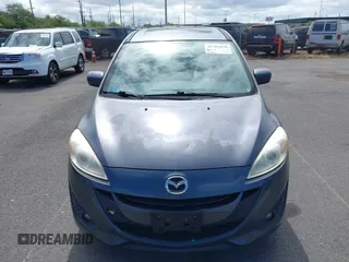 2012 Mazda 5 Grand Touring with VIN JM1CW2DL0C0139982, listed as a IAAI auction lot 42703430 with 129,763 mi miles and . Bid and sale history available at DreamBid. Image 6.