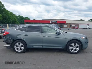 2010 Honda Crosstour EX-L z VIN 5J6TF1H5XAL013687, wystawiony jako IAAI lot #42187755 z przebiegiem 195 579 mil mil oraz . Historia ofert i sprzedaży dostępna na DreamBid. Obrazek 13.
