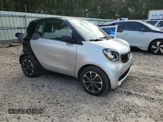 2016 Smart fortwo Passion z VIN WMEFJ5DA6GK057472, wystawiony jako Copart lot #74035244 z przebiegiem 67 826 mil mil oraz Szkoda całkowita • Salvage title. Historia ofert i sprzedaży dostępna na DreamBid. Obrazek 4.