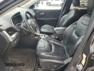 2014 Jeep Cherokee Trailhawk z VIN 1C4PJMBS9EW159721, wystawiony jako Copart lot #60719525 z przebiegiem 136 807 mil mil oraz Szkoda całkowita • Salvage title. Historia ofert i sprzedaży dostępna na DreamBid. Obrazek 7.