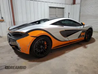 2017 McLaren 570S z VIN SBM13DAA6HW002345, wystawiony jako Copart lot #69572144 z przebiegiem 22 164 mil mil oraz Szkody całkowita. Historia ofert i sprzedaży dostępna na DreamBid. Obrazek 3.