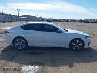 2023 Acura TLX w/Advance Package with VIN 19UUB6F65PA003881, listed as a IAAI auction lot 41360237 with 12,905 mi miles. Bid and sale history available at carsss.com. Image 13.