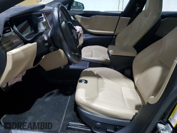 2016 Tesla Model S 90D with VIN 5YJSA1E49GF124514, listed as a Copart auction lot 53864125 with Not provided miles and Salvage title. Bid and sale history available at DreamBid. Image 7.