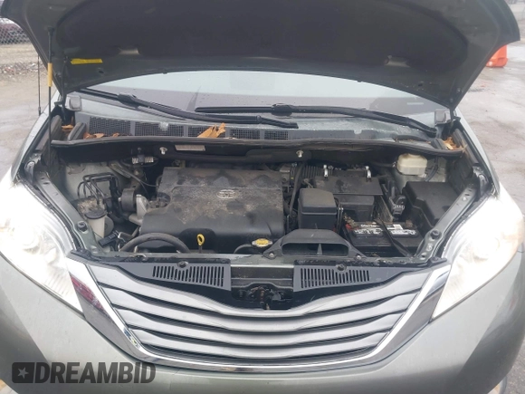 2013 Toyota Sienna XLE AAS with VIN 5TDYK3DC8DS401561, listed as a IAAI auction lot 41990044 with 214,111 mi miles and . Bid and sale history available at DreamBid. Image 10.