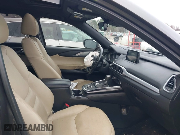 2016 Mazda CX-9 Grand Touring with VIN JM3TCADY4G0111310, listed as a IAAI auction lot 41532851 with 178,907 mi miles and . Bid and sale history available at DreamBid. Image 5.