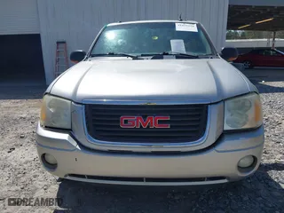 2005 GMC Envoy SLE with VIN 1GKDS13S652390259, listed as a IAAI auction lot 41825258 with 162,172 mi miles. Bid and sale history available at carsss.com. Image 12.