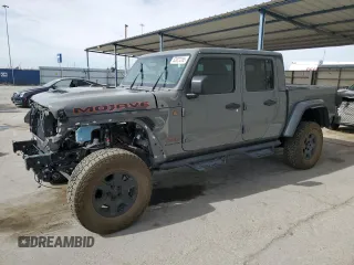 2023 Jeep Gladiator Mojave z VIN 1C6JJTEG7PL548084, wystawiony jako Copart lot #52827265 z przebiegiem 26 789 mil mil oraz Czysty tytuł • Clean title. Historia ofert i sprzedaży dostępna na DreamBid. Obrazek 1.