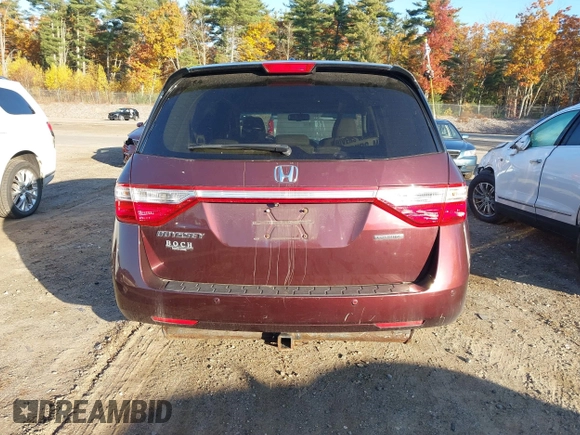 2012 Honda Odyssey Touring with VIN 5FNRL5H9XCB067841, listed as a IAAI auction lot 40631672 with 210,237 mi miles and . Bid and sale history available at DreamBid. Image 17.