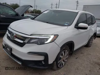 2020 Honda Pilot EX-L with VIN 5FNYF5H55LB029238, listed as a IAAI auction lot 41330490 with 116,787 mi miles. Bid and sale history available at carsss.com. Image 17.