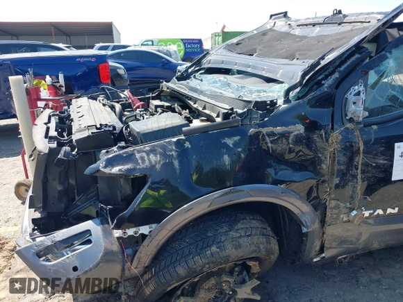 2021 Nissan Titan Pro-4X with VIN 1N6AA1ED4MN515673, listed as a IAAI auction lot 42028678 with 128,719 mi miles and . Bid and sale history available at DreamBid. Image 6.